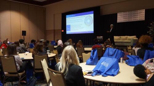 A shot of the conference's center stage room, filled to the brim with talented women.